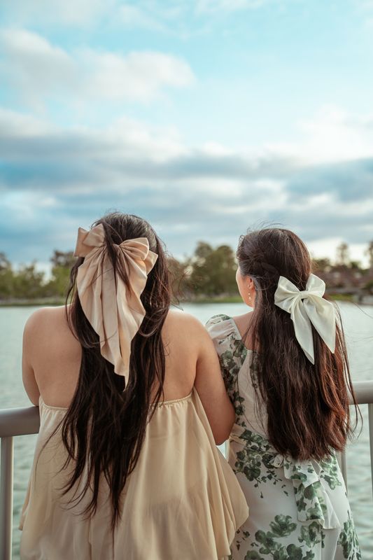 Two friends looking out over the water