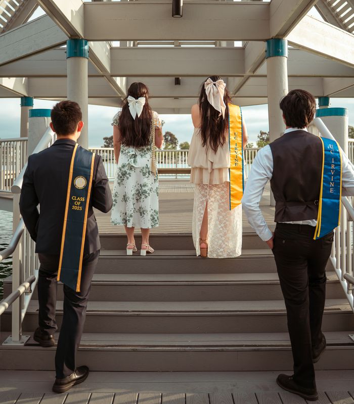 A group posing on gazebo steps
