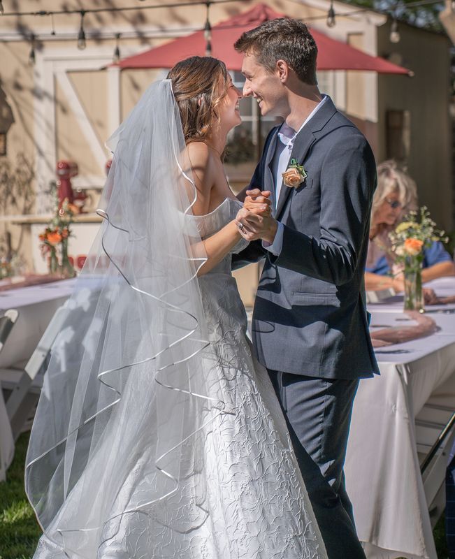 The couple sharing a kiss